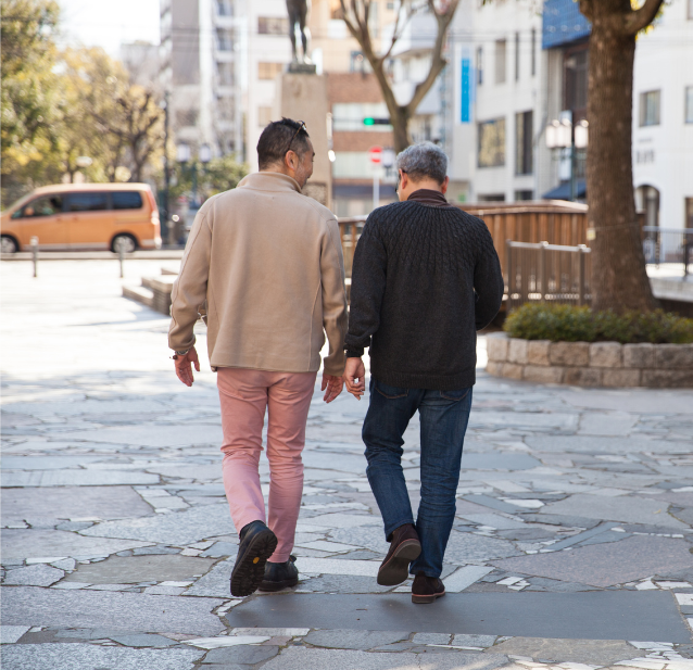 two men walking city
