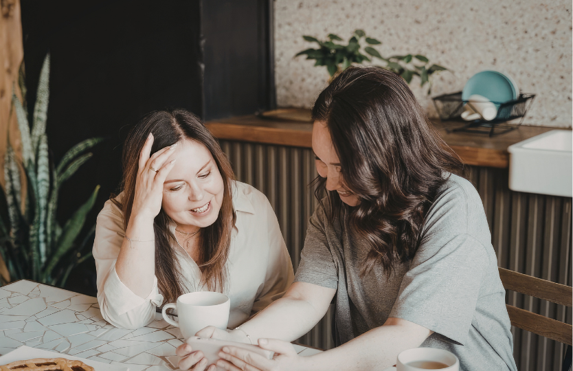two women at table